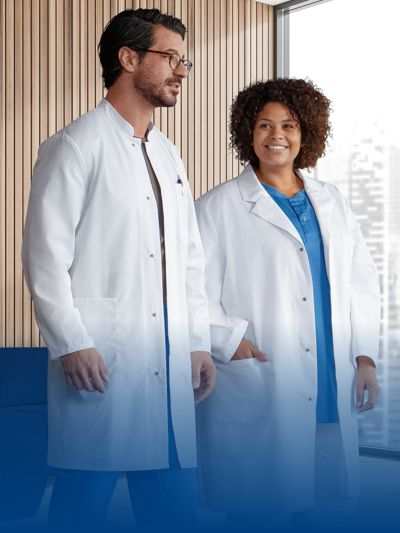 A male and female doctor are wearing white coats.